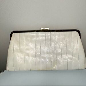 Chic Cream Clutch with Metallic Accents
